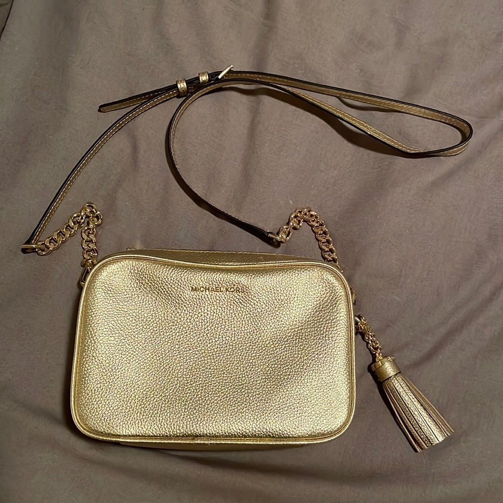 Gold crossbody Michael Kors purse